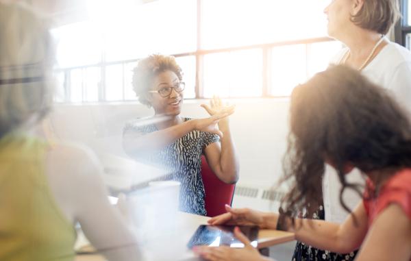 African American Woman Leading a Meeting