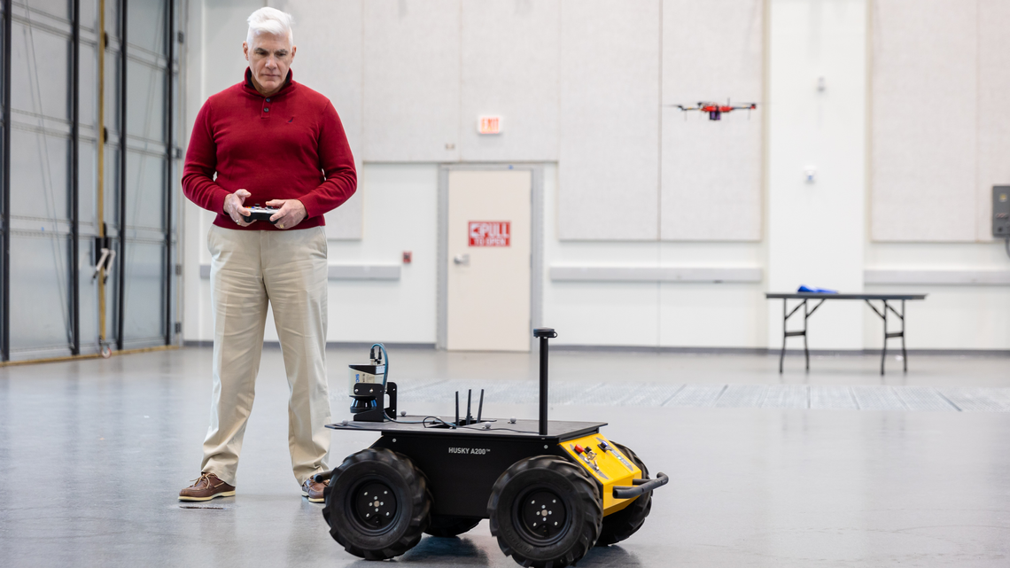 Tracking drones and robots with pinpoint precision in an open air-land lab; watching students build and test their prototypes in a large project assembly space; creating an autonomous school of robotic fish in a water tunnel – it’s all in a day’s work for the people who study, teach and conduct research in the Southern Maryland Autonomous Research and Technology (SMART) Building, on the campus of the University System of Maryland Southern Maryland (USMSM).  “If they put teeth on it, I’m getting out of the water!” joked Matt Scassero, director of Operations and Outreach at the University of Maryland (UMD) Clark School of Engineering’s MATRIX Lab, which is housed in the SMART Building. Biting robotic fish aside, Scassero is an enthusiastic supporter of all the autonomy-focused SMART building offers its users.  “The SMART Building is a really interesting collaboration of education and research. It’s both physically and conceptually designed for working together, to have students involved in the research and researchers involved in the education programming – because that’s how we develop our workforce of the future,” said Scassero.  Part of the AeroPark Innovation District, the 84,000-square-foot building feels like the future. Housing the MATRIX Lab, the SMART Building offers students and faculty leading-edge underwater, air and land testing facilities. But that’s not all. The SMART Building also provides unique opportunity for students and faculty, allowing them to combine education and research, promoting the advancement of innovation while simultaneously encouraging talent retention in Maryland.  Students applaud the program and the building, citing the excellent faculty who are readily available, the innovative space and research opportunities, and the close relationships with real-world partners, including relationships they develop through a myriad of local internships.  This SMART building houses robotic fish and Southern Maryland’s future workforce The SMART Building is much more than an education center. I