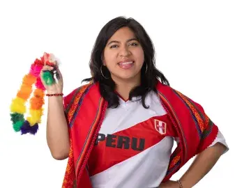 Valery Gutierrez in Peru jersey and red shawl, holding a rainbow wig