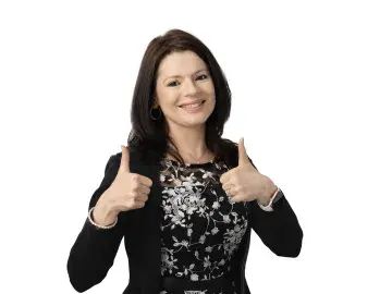Ruchika Nijhara PhD giving two thumbs up on white background.