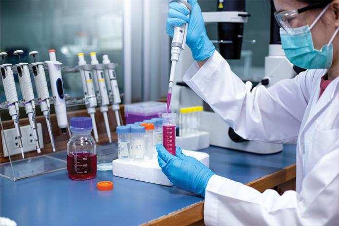 Individual working in a research laboratory